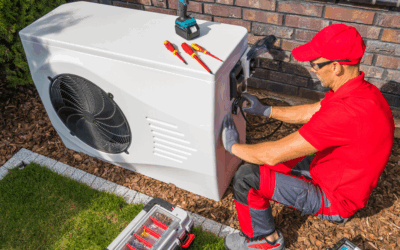 A man repairing a heat pump